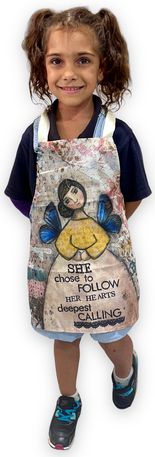 whimsy and me, multi colored, mixed media, girl, brunette, framed, recycled frame, brown eyes, whimsical girl, flowers, blue butterfly wings, gold highlights, kids apron